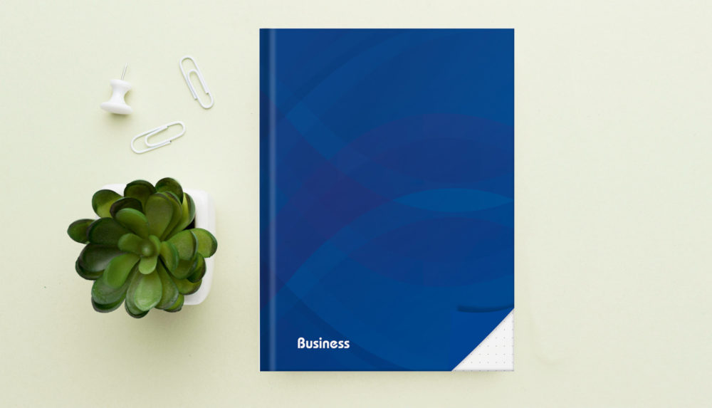 Notizbuch "Business blau" auf dem Tisch