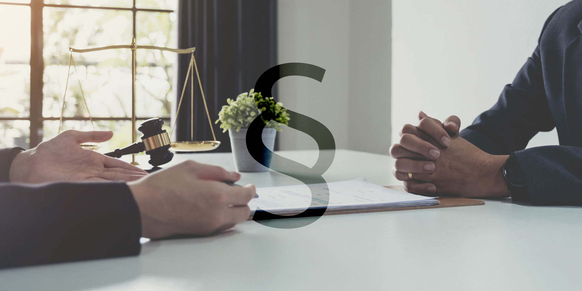business people and lawyers discussing contract papers sitting a